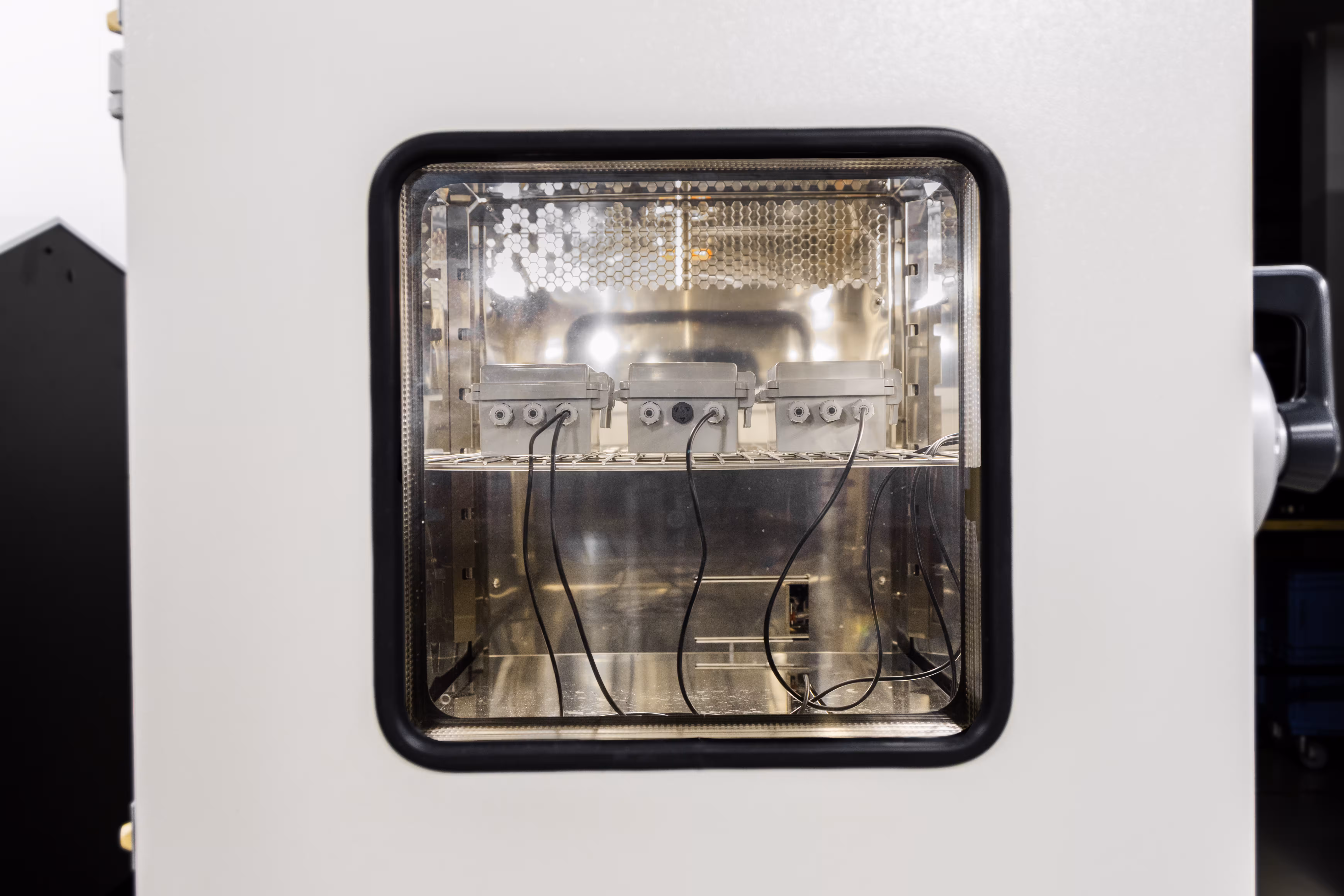 IoT device inside the climate chamber during an extended temperature cycling test